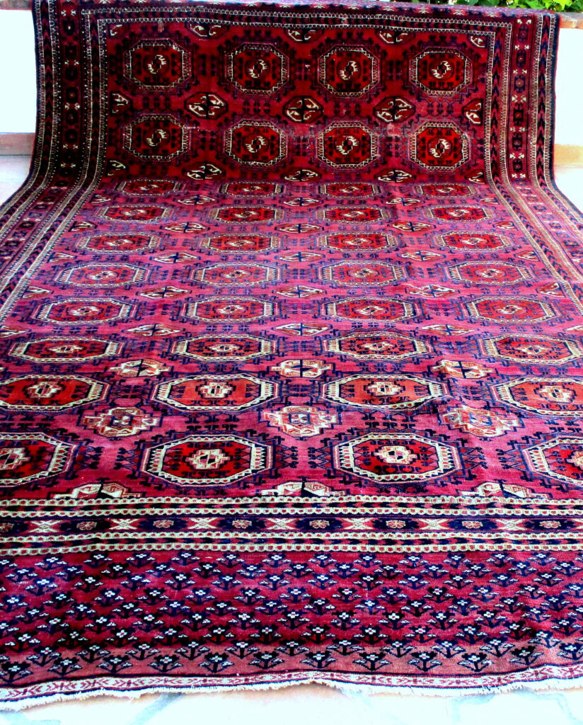 ANTIQUE TEKKE TURKOMAN CARPET DATING FROM THE SECOND HALF OF THE 19TH CENTURY